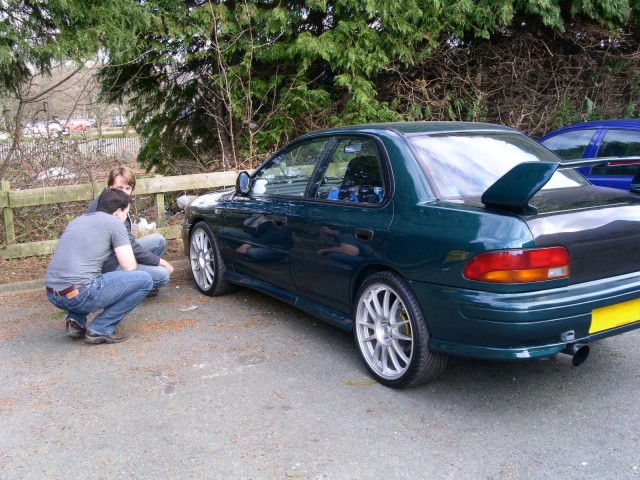 Neil showing me some 8-pot brakes, which are an option on the Murtaya