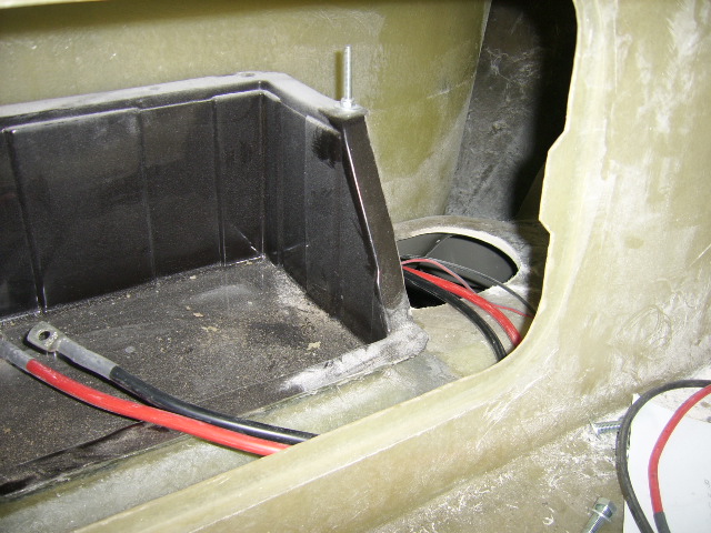 Battery box and fuel tank access hole